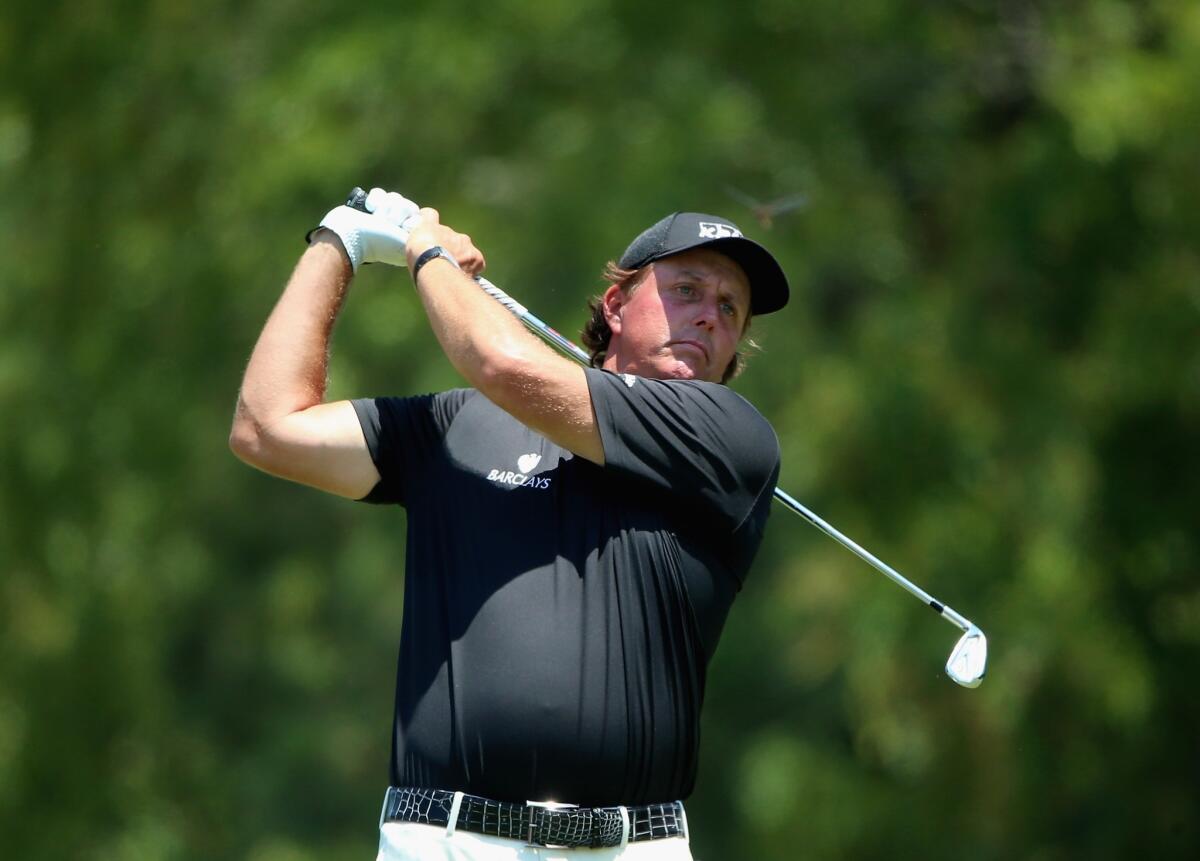 Phil Mickelson hits his tee shot on the sixth hole on Sunday during the final round of the U.S. Open at Pinehurst.