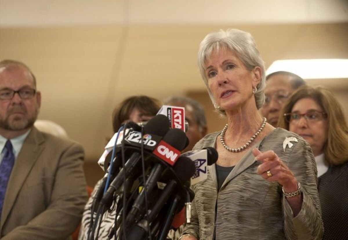 Facing the music on Obamacare: Health and Human Services Secretary Kathleen Sebelius speaks at a Phoenix news conference last week.