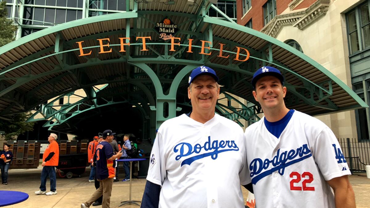 Rob, left, and Randy Webb are all set for Game 3 of the World Series at Minute Maid Park on Friday.