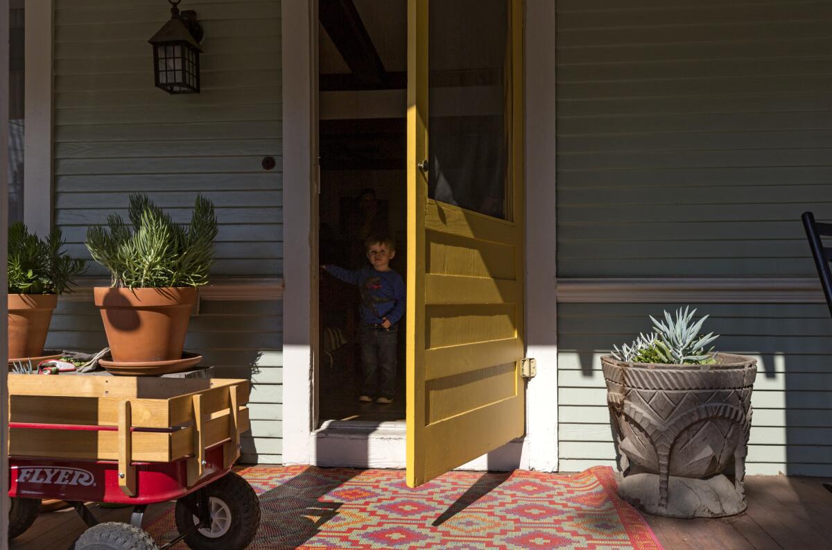 Enzo O'Neill, 2, inside the 1905 Highland Park home that his father, Taidgh O'Neill, completely refurbished.