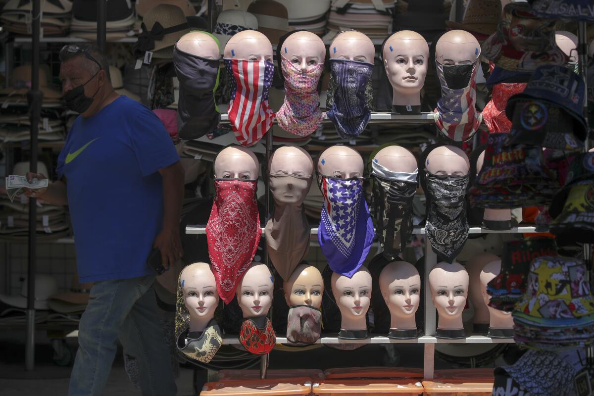 A vendor sells face masks.