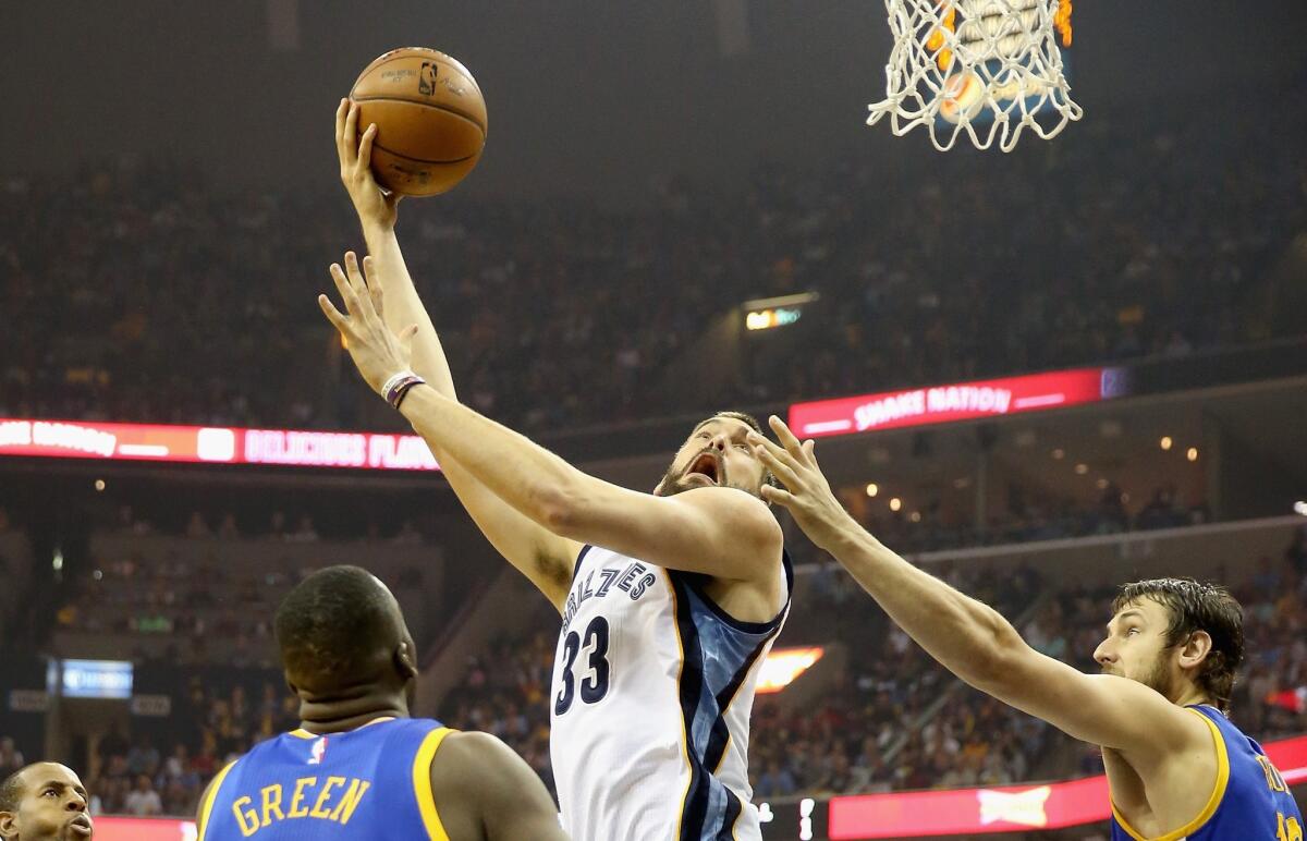 Grizzlies' Marc Gasol takes a shot during Game 3 against Golden State on Saturday in Memphis.