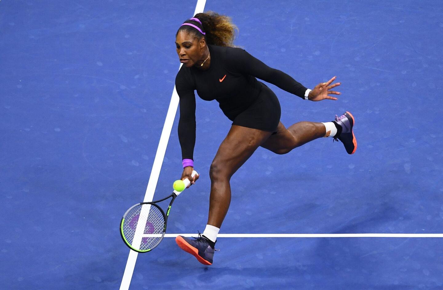 Serena Williams returns the ball against Elina Svitolina during their Women's Singles semifinal match inside the Billie Jean King National Tennis Center in Queens on Sept. 5, 2019.