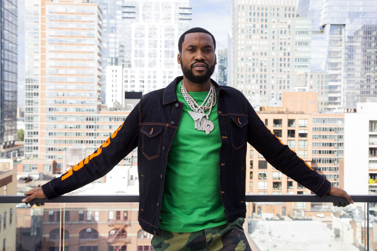 Meek Mill poses for a portrait at the Roc Nation offices in New York on Sept. 22, 2021, to promote his upcoming album “Expensive Pain.” The Philadelphia rapper is planning a concert on Oct. 23 at Madison Square Garden to celebrate the new album. (Photo by Andy Kropa/Invision/AP)