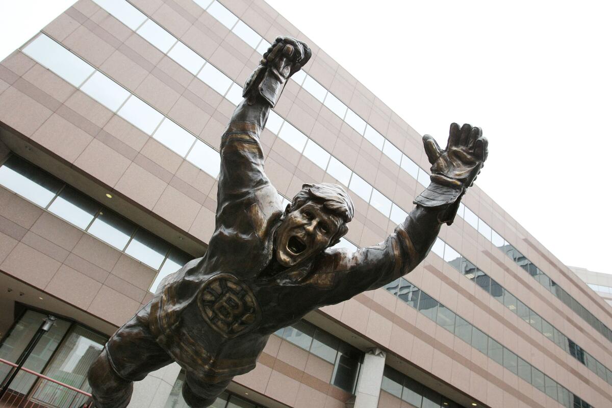 A statue of Bruins legend Bobby Orr is shown in front of TD Garden in Boston during the 2011 Stanley Cup playoffs.