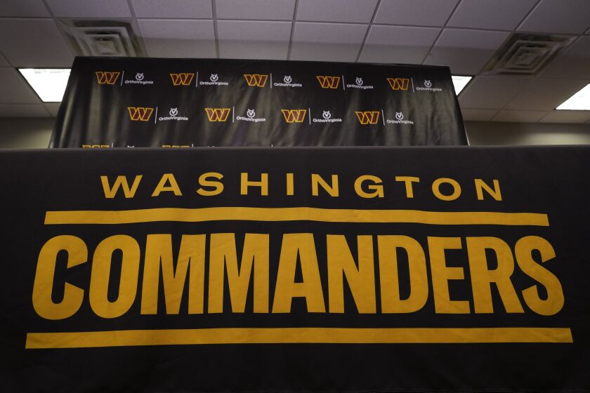 FILE - The Washington Commanders football team's name and logo is seen at the NFL football team's facility in Ashburn, Va., Nov. 10, 2022. According to a report published Thursday, Dec. 8, by the U.S. House Committee on Oversight and Reform, the Washington Commanders created a “toxic work culture” for more than two decades, “ignoring and downplaying sexual misconduct” by men at the top levels of the organization. (AP Photo/Manuel Balce Ceneta, File)