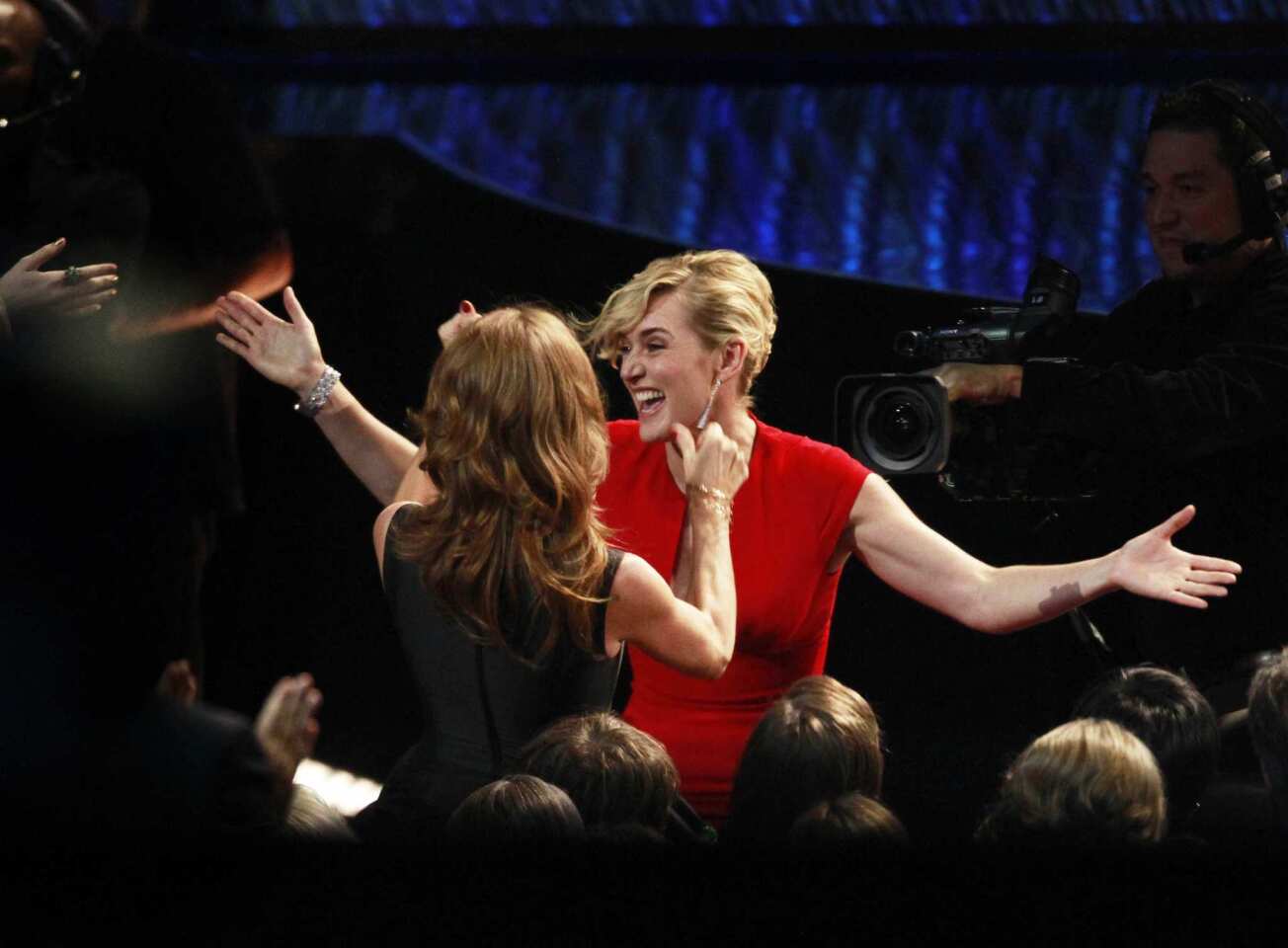 "Mildred Pierce" actress Kate Winslet reacts after winning the Emmy for lead actress in a miniseries or TV movie.