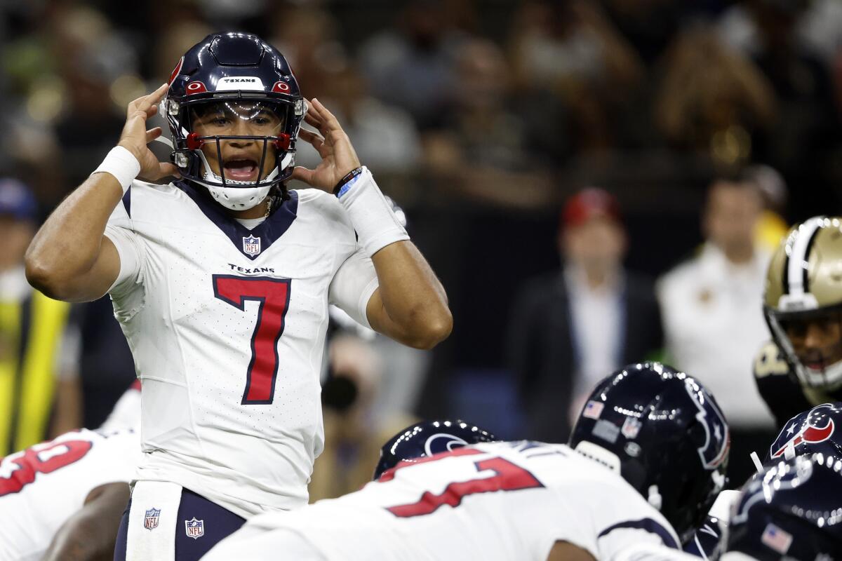 Houston Texans quarterback C.J. Stroud (7) signals from line of scrimmage.