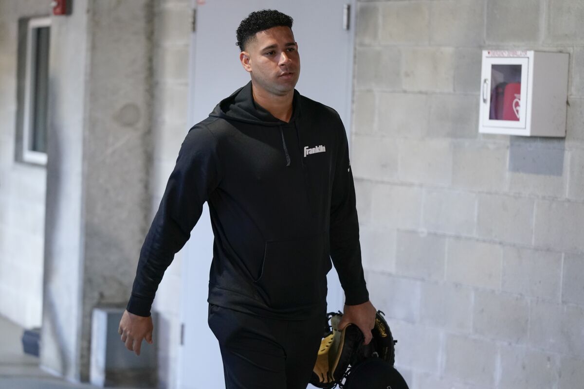 New York Yankees catcher Gary Sánchez arrives at the spring training baseball facility, Sunday, March 13, 2022, in Tampa, Fla. (AP Photo/John Raoux)