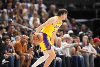 Los Angeles Lakers guard Austin Reaves (15) in the second half of an NBA basketball game.