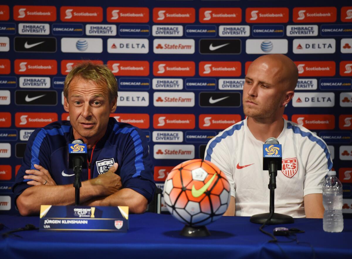 U.S. Coach Juergen Klinsmann, left, and team captain Michael Bradley discuss Saturday's match with Mexico at a news conference at the Rose Bowl in Pasadena on Friday.