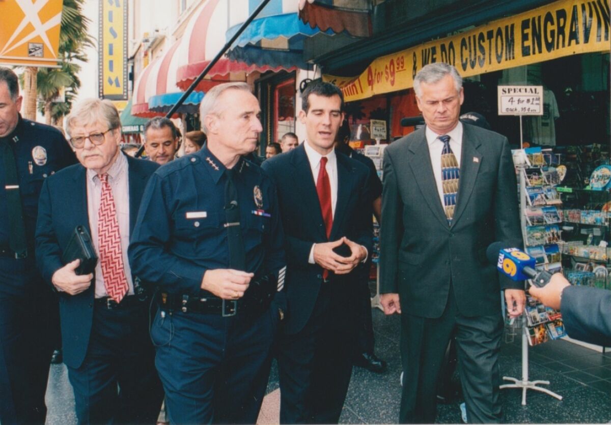Bill Bratton, second from left, with George Kelling, left, Eric Garcetti and Jim Hahn.