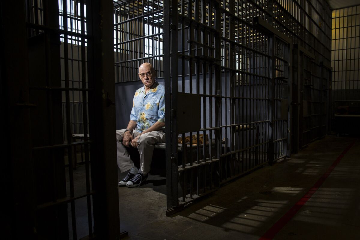 Author James Ellroy inside a replica jail cell at the Los Angeles Police Museum.