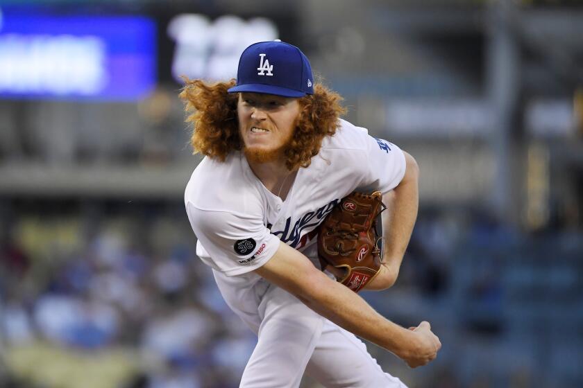Los Angeles Dodgers starting pitcher Dustin May throws during the second inning of the team's baseball game against the San Diego Padres on Friday, Aug. 2, 2019, in Los Angeles. (AP Photo/Mark J. Terrill)