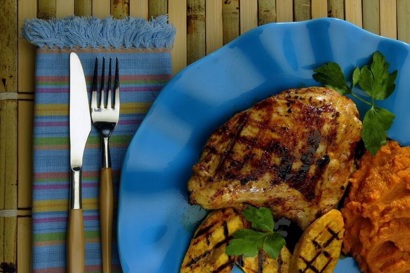 Chicken is glazed with an Anejo rum sauce. Recipe: Chicken with Anejo rum glaze.