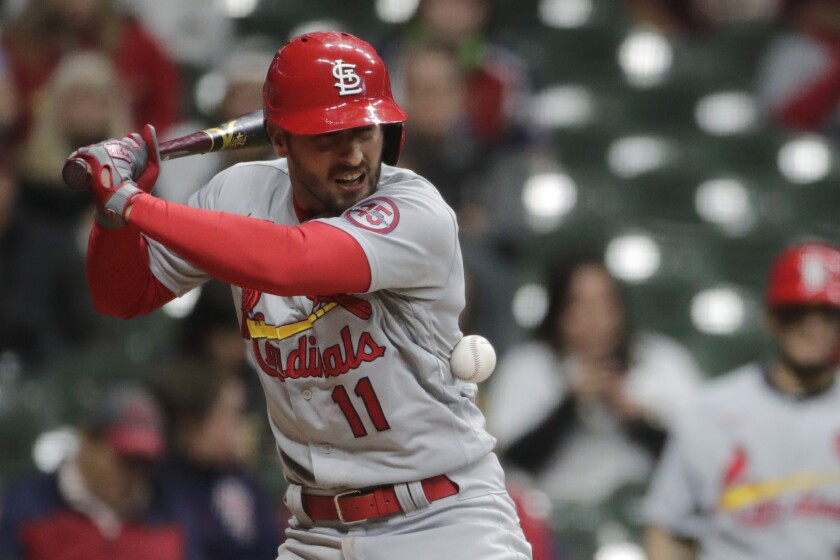 St. Louis Cardinals' Paul DeJong gets hit by a pitch during the seventh inning of the team's baseball game against the Milwaukee Brewers on Tuesday, May 11, 2021, in Milwaukee. (AP Photo/Aaron Gash)