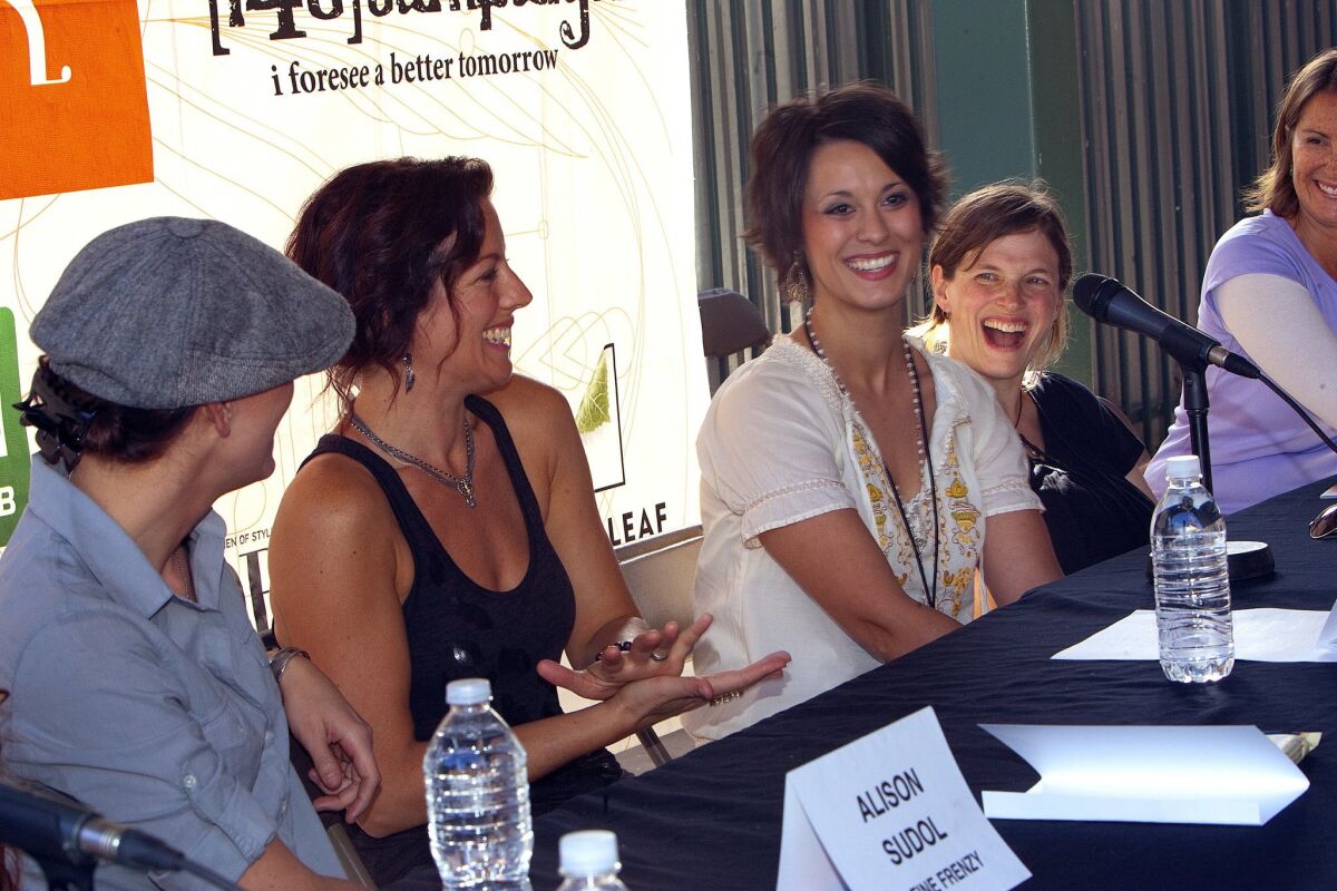 Sarah McLachlan (second from left) is shown in San Diego at a press conference prior to the 2010 Lilith Fair festival show here.  San Diego singer-songwriter Ashley Matte is seated in the center, immediately to McLachlan's right.