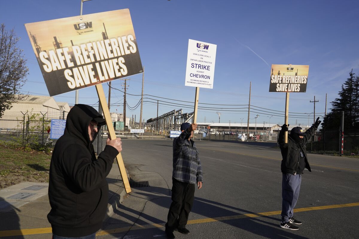 Picketers outside Chevron’s refinery in Richmond, Calif.