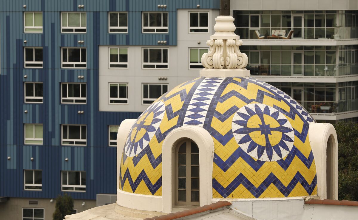 Tiled cupolas adorn the roof of the Herald Examiner Building