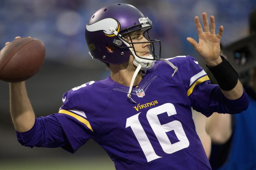 Minnesota Vikings quarterback Matt Cassel warms up before a game against the Detroit Lions on Dec. 29, 2013. The Vikings traded Cassel to the Buffalo Bills on Wednesday.