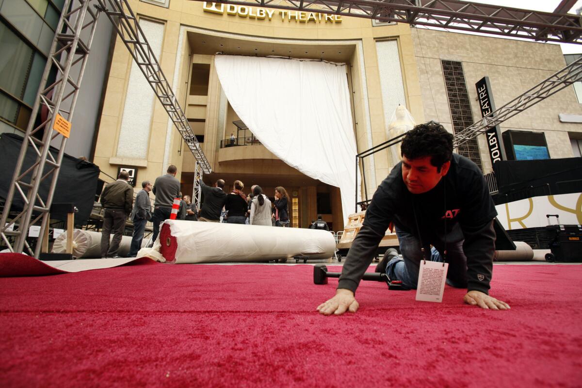 While some ready the red carpet outside the Dolby Theatre, others prepare to protest.
