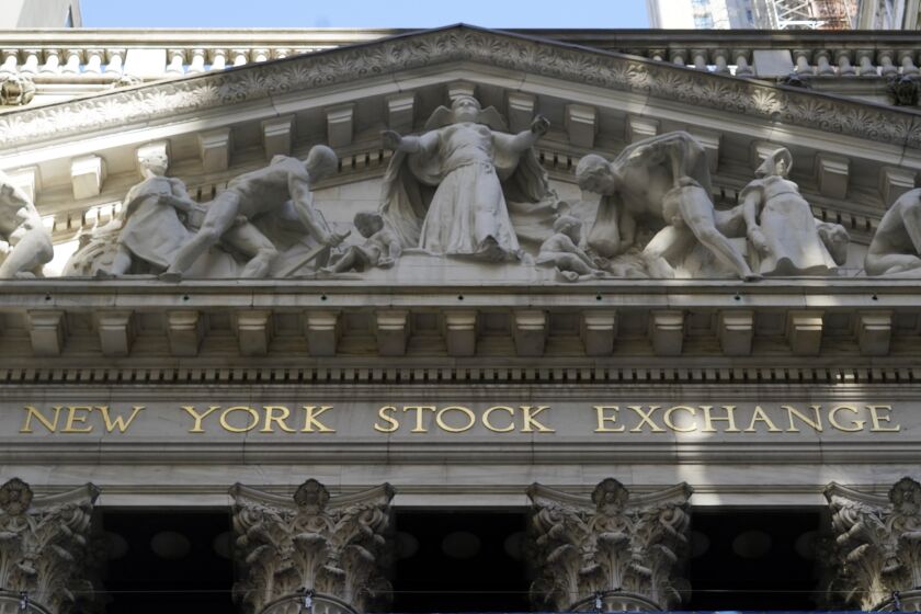 FILE - In this June 16, 2021 file photo, the facade of the New York Stock Exchange. Stocks are opening higher on Wall Street, Wednesday July 21, as the market continues to recover from a sharp drop at the beginning of the week. (AP Photo/Richard Drew, File)