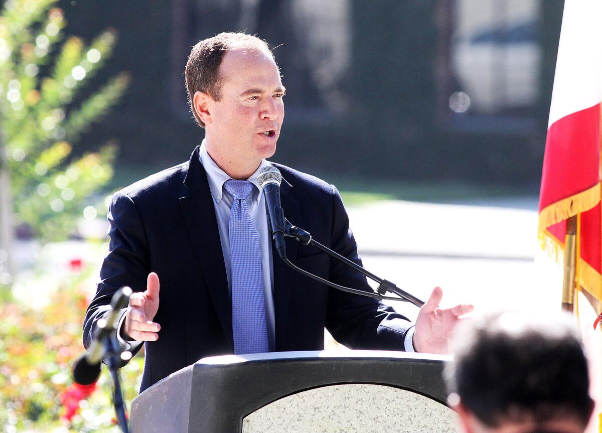 File Photo: Rep. Adam Schiff (D-Burbank) speaks at the Veterans Day Ceremony at the McCambridge Park War Memorial in Burbank in November 2013. He is participating in the AIDS/LifeCycle, a 545-mile bike ride from San Francisco to Los Angeles, to raise money and awareness for research and treatment.