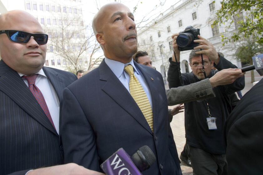 Former New Orleans Mayor C. Ray Nagin leaves the Hale Boggs Federal Building and United States District Courthouse in the city after pleading not guilty at an arraignment on corruption charges. Nagin did not speak with reporters.