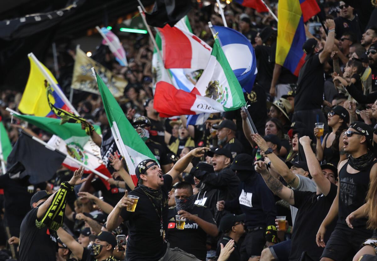 LAFC fans cheer during Sunday's game at Banc of California Stadium.