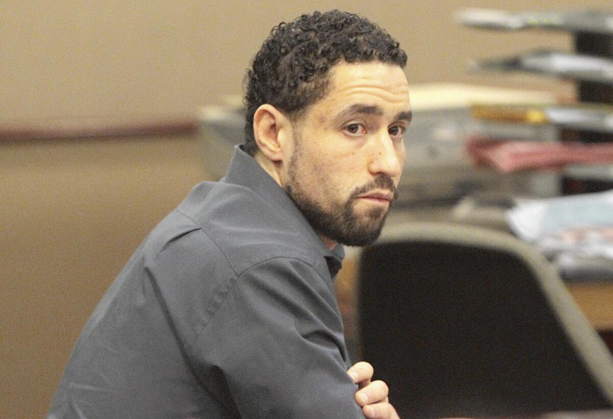 Defendant Alex Donald Jackson, being tried after his four pit bulls killed a woman, listens to the proceedings in his murder trial at Los Angeles County Superior Court in Lancaster. On Friday he was convicted on second-degree murder.