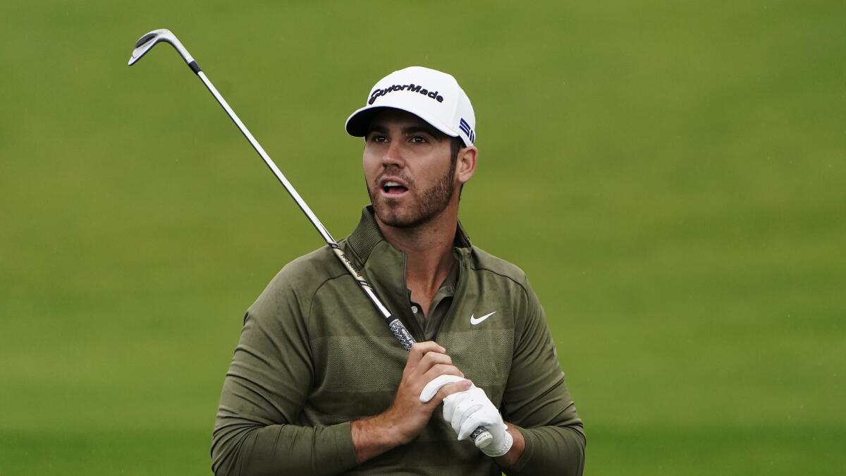 Matthew Wolff waits to hit at the driving range during a practice round for the Masters on Tuesday in Augusta, Ga.