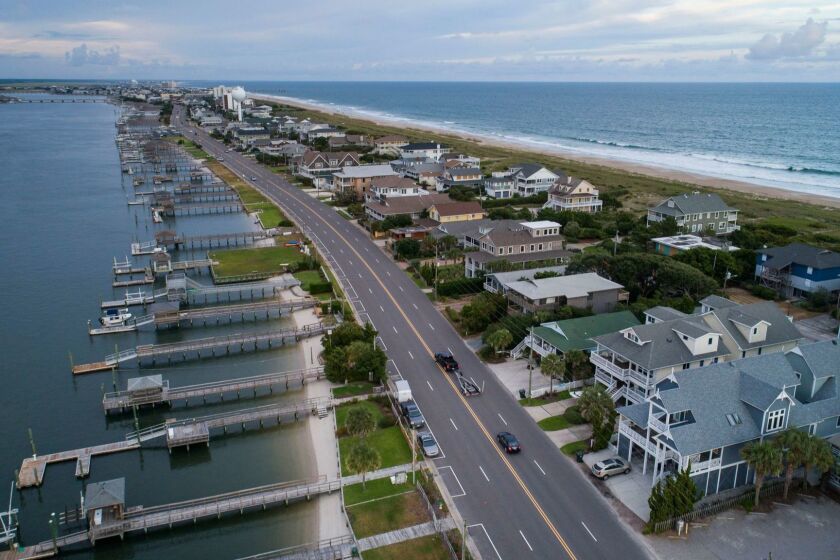 Mandatory Credit: Photo by JIM LO SCALZO/EPA-EFE/REX/Shutterstock (9879721d) The streets are nearly empty two days before Hurricane Florence is expected to strike Wrightsville Beach, North Carolina USA, 11 September 2018. Hurricane Florence is a category 4 storm on the Saffir-Simpson Hurricane Wind Scale, with winds toping 165 miles per hour. No category 4 hurricane has ever made landfall in North Carolina. Hurricane Florence to strike East Coast of United States, Wilmington, USA - 11 Sep 2018 ** Usable by LA, CT and MoD ONLY **