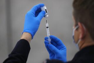 SAN DIEGO, CA - FEBRUARY 03: A Moderna COVID-19 vaccine shot is prepared at the homeless shelter in the San Diego Convention Center on Wednesday, Feb. 3, 2021 in San Diego, CA. Residents 65 years-old and older qualified for the shot at the center. (K.C. Alfred / The San Diego Union-Tribune)