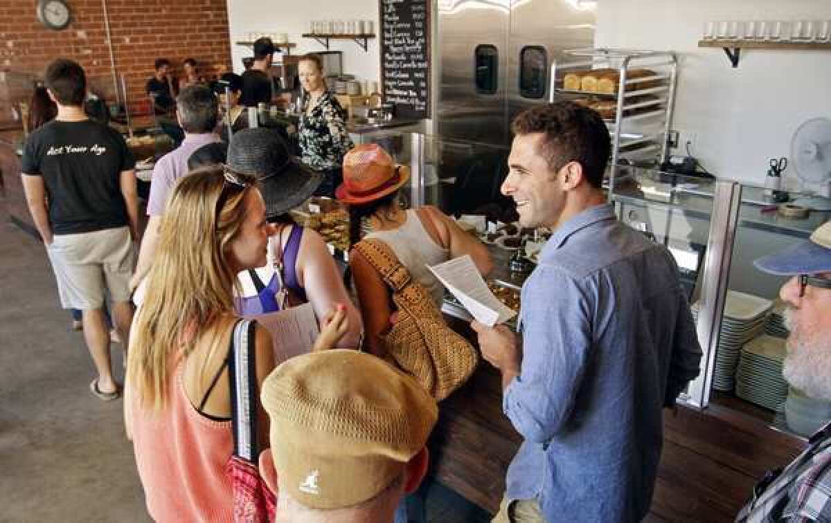 Customers line up to order at Sycamore Kitchen bakery cafe.