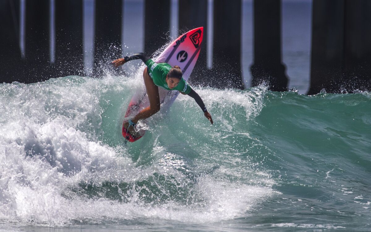 Allen J. Schaben  Los Angeles Times A wave of the future Sol Aguirre of Peru turns at the top of a wave.