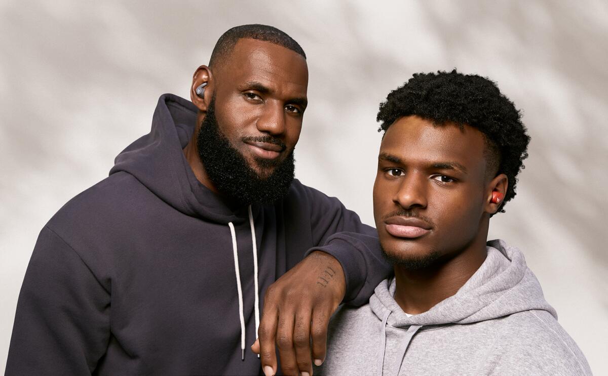 Bronny James, right, and father LeBron James are brand ambassadors for Beats by Dre.