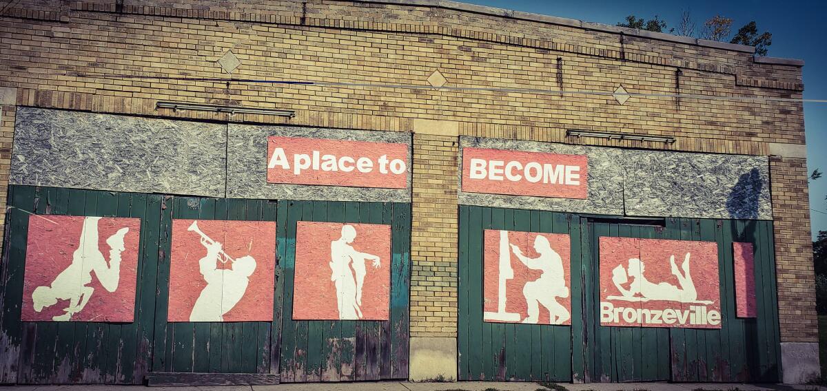 Artwork on a long-shuttered business along North Avenue in Milwaukee hints at the street's historical importance.