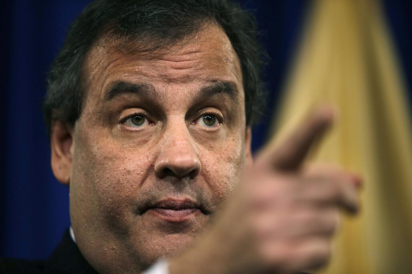 Gov. Chris Christie (R-N.J.) tells reporters he fired his aide behind a scheme to create a traffic jam on the George Washington Bridge as political retribution for a Democratic mayor who did not endorse Christie's reelection bid. "Bridgegate," as it's come to be known, has continued to haunt the possible 2016 candidate.