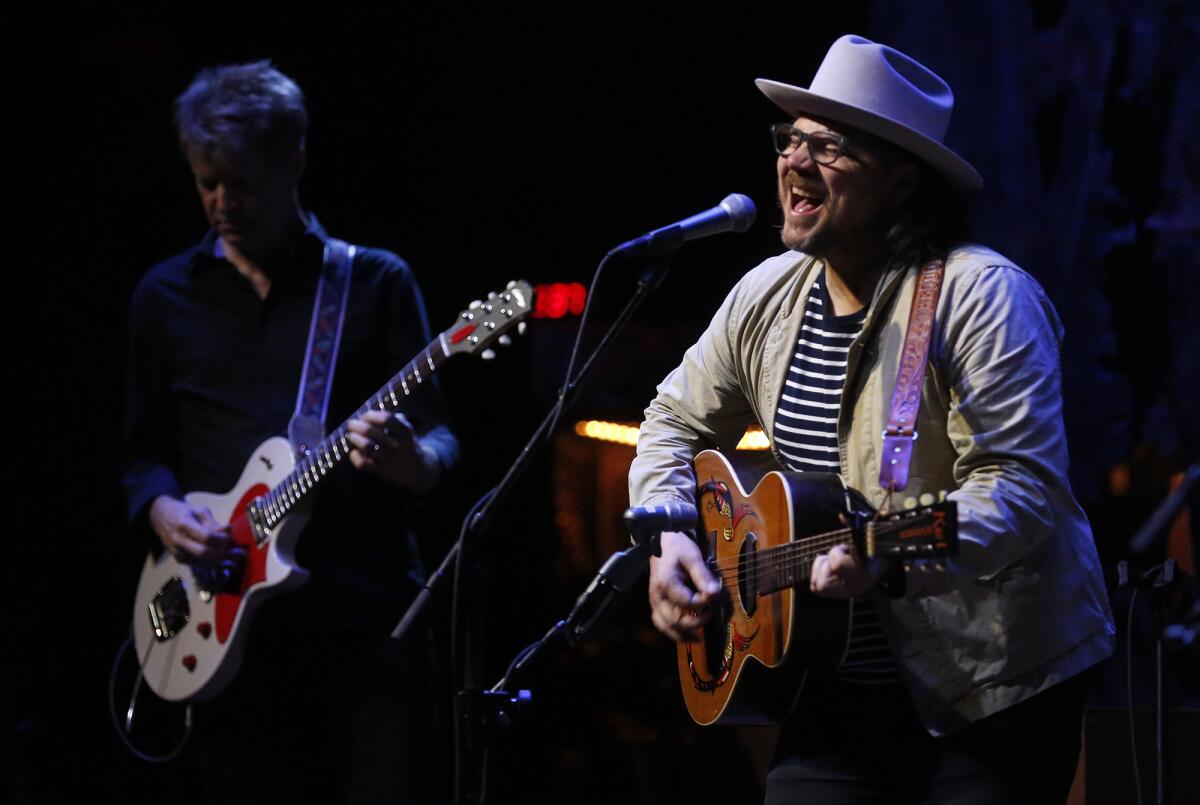 Jeff Tweedy, with Nels Cline, left, playing with Wilco at the Ace Hotel in 2016