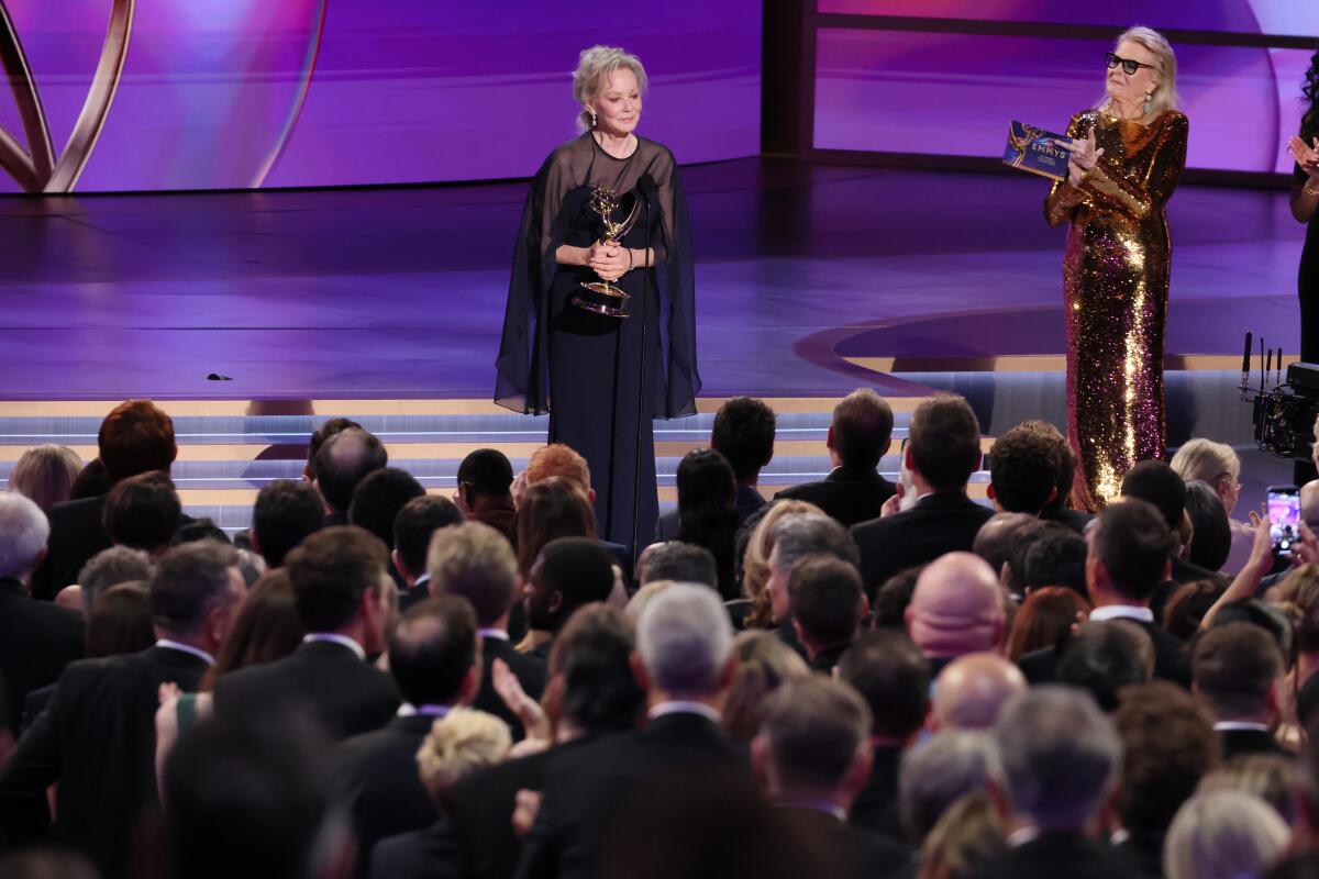 Presenter Candice Bergen applauds Jean Smart as she accepts her Emmy for comedy actress for "Hacks."