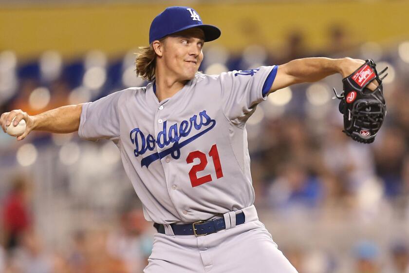 Dodgers starter Zack Greinke delivers a pitch during the first inning of Sunday's game against the Miami Marlins at Marlins Park.