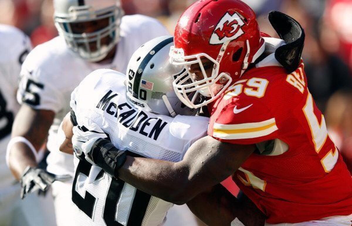 Chiefs linebacker Jovan Belcher tackles running back Darren McFadden of the Oakland Raiders during their game last month at Arrowhead Stadium.