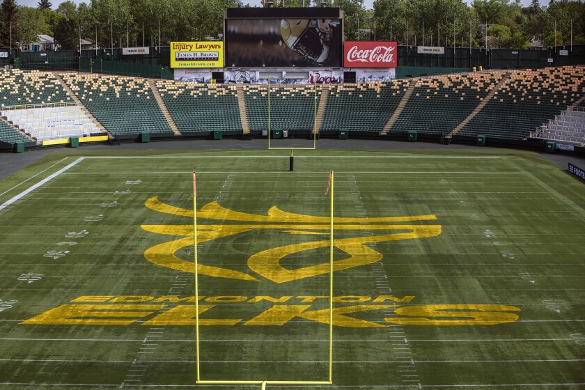 The Edmonton Elks Canadian Football League name and logo are displayed at Commonwealth Stadium in Edmonton, Alberta, Tuesday, June 1, 2021. The Edmonton CFL franchise has changed its team name to Elks. Edmonton dropped its longtime name, Eskimos, last year following a similar decision by the NFL’s Washington team amid pressure on franchises to eliminate racist or stereotypical names. (Jason Franson/The Canadian Press via AP)