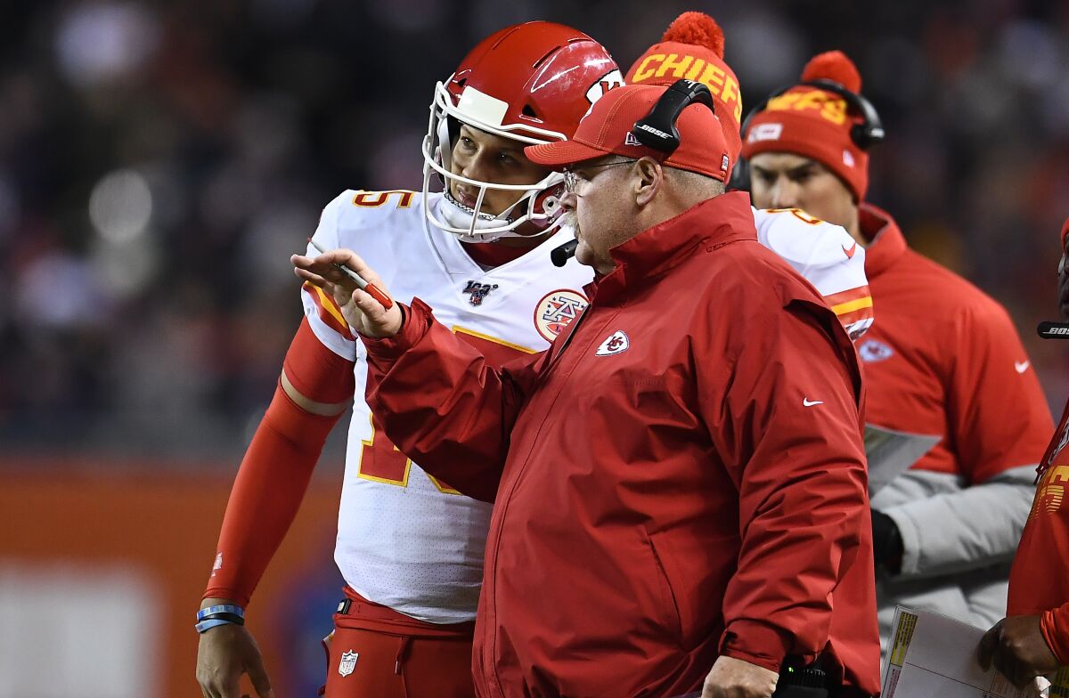 Kansas City coach Andy Reid and quarterback Patrick Mahomes talk during a timeout against Chicago at Soldier Field on Dec. 22, 2019.