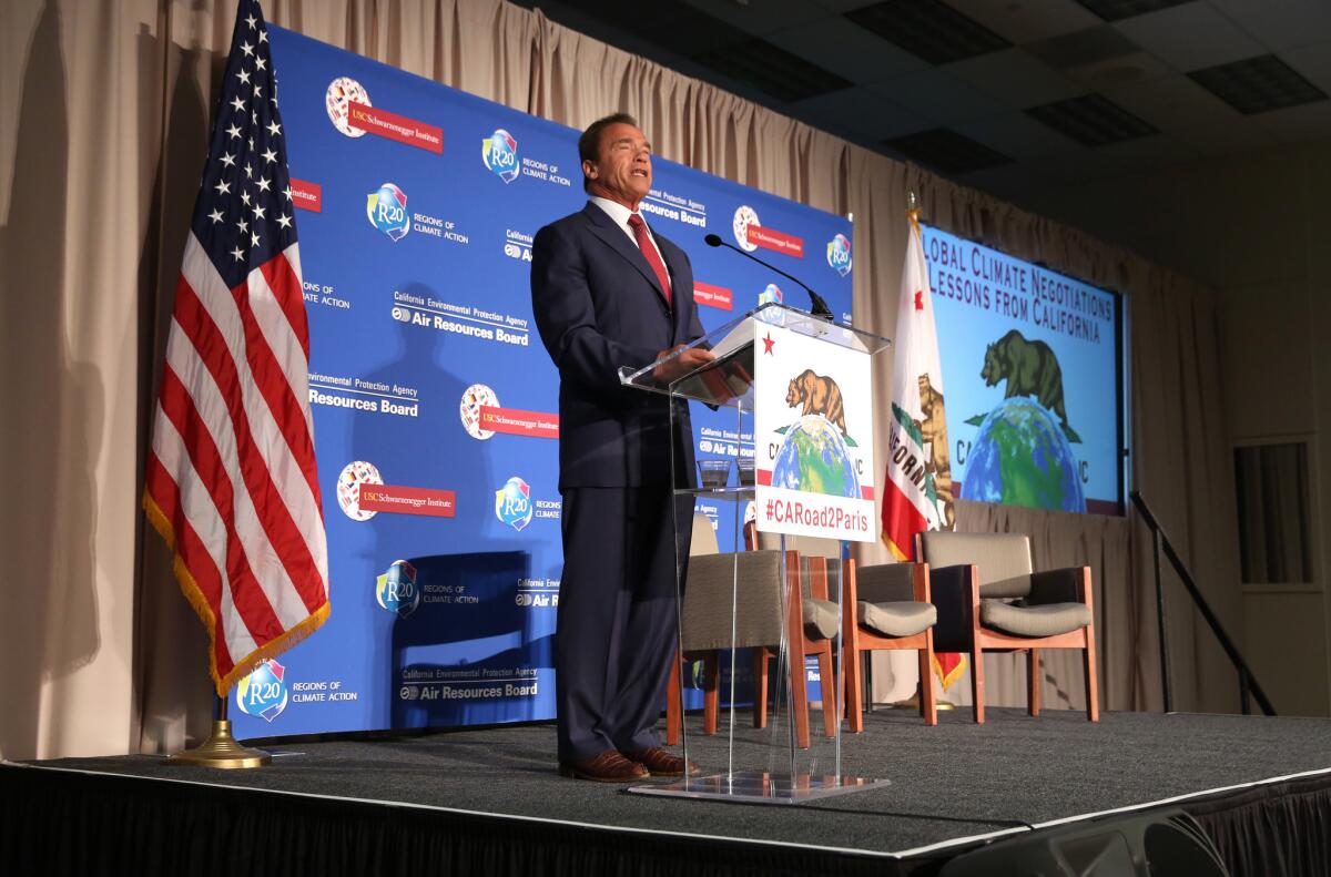 Former California Gov. Arnold Schwarzenegger discusses climate change at a conference in Sacramento on Monday morning.