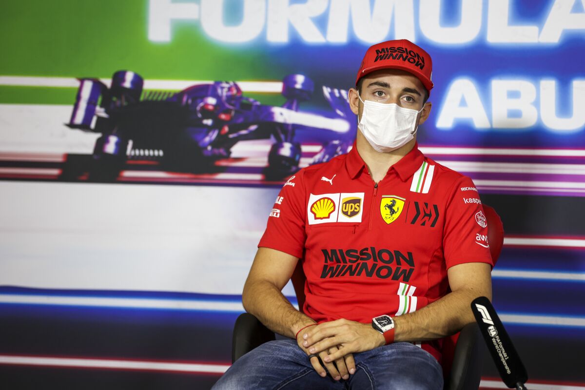 Ferrari driver Charles Leclerc of Monaco speaks during a press conference ahead of the ormula One Abu Dhabi Grand Prix in Abu Dhabi, United Arab Emirates, Thursday, Dec. 9, 2021. (Antonin Vincent, Pool via AP)