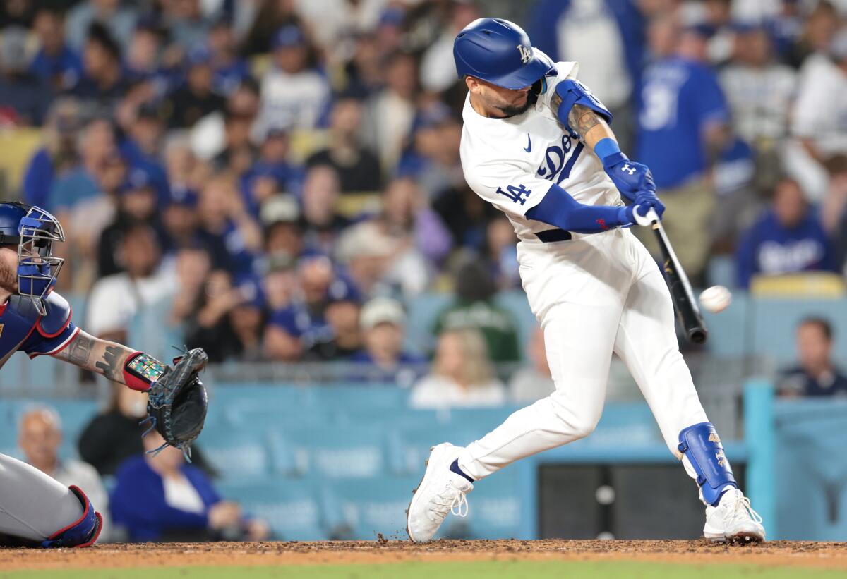 Andy Pages hits a solo home run for the Dodgers in the seventh inning Thursday.