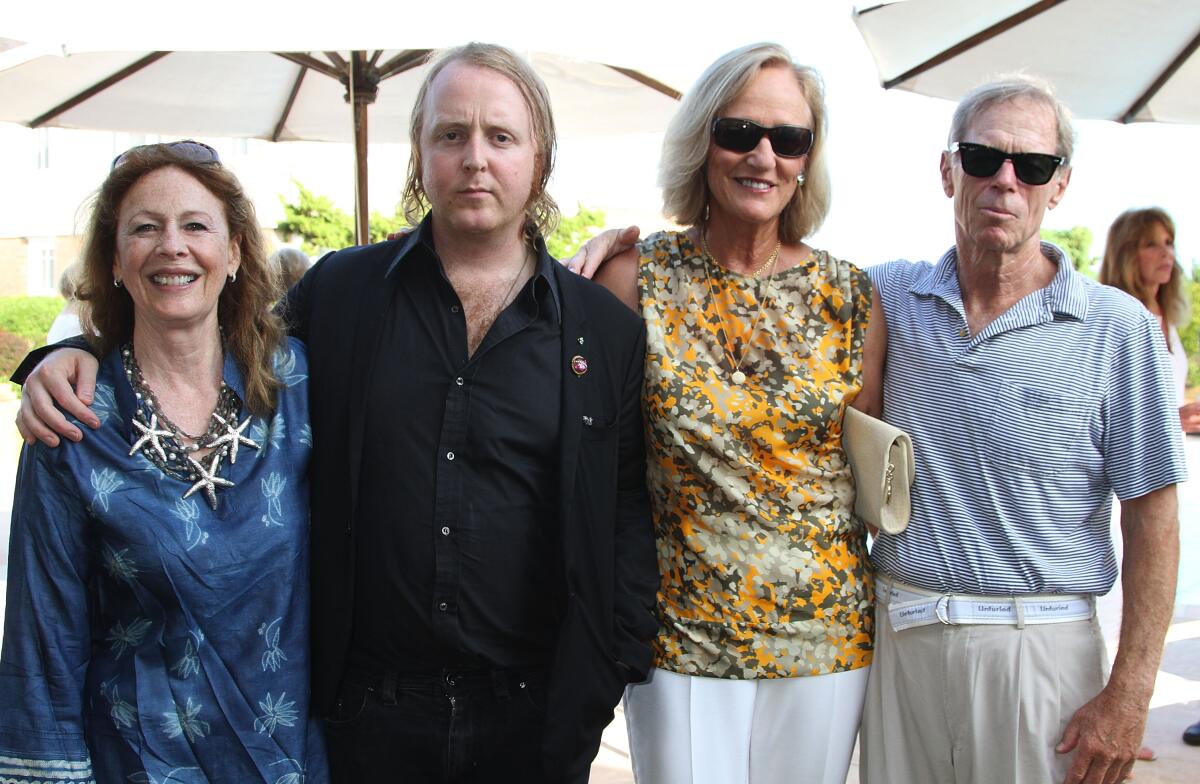 John Eastman on right with Sydney Picasso, from left, James McCartney and Jodie Eastman in 2012.