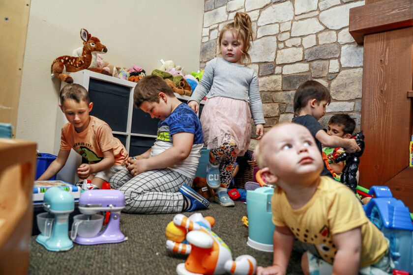 CHULA VISTA, CA-APRIL 7:Ukrainian refugee kids play in a children's area at Calvary Chapel on Thursday, April 7, 2022 in the Eastlake Chula Vista area. The refugees are offered temporary shelter at Calvary Chapel after crossing the U.S.-Mexico border. (Photo by Sandy Huffaker for The San Diego Union-Tribune)