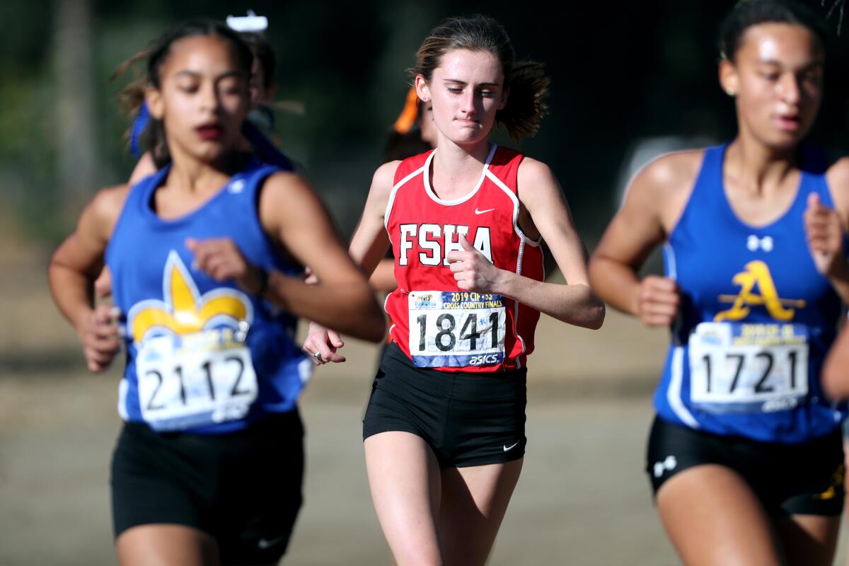 Flintrdge Sacred Heart Academy senior Lauren Nettles ran in the girls division 4 CIF Southern Section Cross Country Finals, at Riverside City Cross-Country Course in Riverside on Saturday, Nov. 23, 2019.
